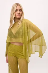 Poncho de fiesta color verde con hilos dorados, confeccionado en chiffon.