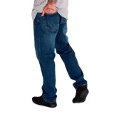 Pantalón de jean color verde militar, de corte slim, con cinco bolsillos y logo CAT en la parte trasera.