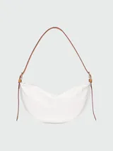 Bandolera Longchamp modelo Crossbody Smoothie M, color gris topo, con correa ajustable y cierre de cremallera.