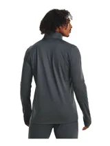 Buzo deportivo Under Armour Challenger de hombre, color naranja con paneles laterales en gris oscuro, cuello alto con cierre de cremallera corto, mangas largas con orificios para los pulgares y logo de la marca estampado en el pecho.