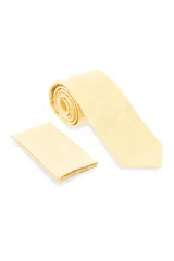 Corbata beige con diseño de puntos, acompañada de pañuelo a juego, ideal para ocasiones formales.
