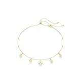 Collar dorado con colgantes de circonitas Swarovski de diferentes formas.