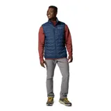 Chaleco acolchado Columbia Delta Ridge II para hombre, color azul marino con logo de la marca en el pecho. Cuenta con tecnología termorreflectiva Omni-Heat, HeatSeal y Omni-Shield. Relleno de plumón con certificación RDS.