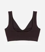 Soutien tipo bralette color gris, confeccionado en poliamida con acabado seamless y breteles anchos fijos. Presenta escote en V y una pequeña etiqueta con el logo "lov" en la parte frontal inferior.