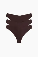 Pack de tres colaless color marrón de microfibra, tiro bajo con cintura en V, refuerzo interior y ribetes cortados por láser.