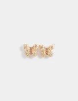 Par de aros dorados con forma de mariposa con incrustaciones de strass en tonos rosa, lila y blanco.