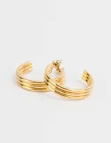 Aros tipo argolla triples bañados en oro.