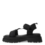 Sandalias de mujer color beige con plataforma plana y tiras de ajuste textil.