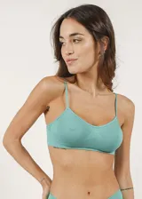 Soutien tipo top de microfibra, sin costuras, sin aro y sin copas.