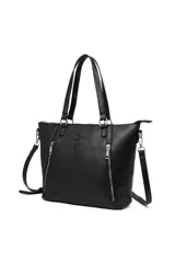 Bolso negro tipo shopper con doble asa de mano y correa bandolera desmontable. Tiene dos cierres verticales decorativos en el frente y la palabra 'TRENDY' grabada en vertical.