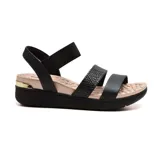 Sandalias negras con plataforma baja, tiras anchas y elásticas.