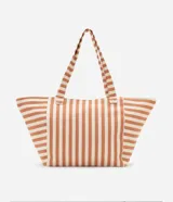 Bolso tipo tote bag de tela color crudo con rayas verticales color ladrillo.