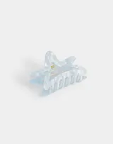 Broche para el pelo en forma de estrella, color celeste con efecto marmolado.