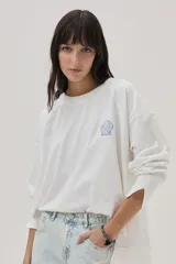Sweater de algodón blanco, de corte holgado, con bordado decorativo al frente y en la espalda con motivos marinos y texto en italiano.