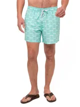 Short de baño celeste con estampado de ballenas en azul y gris. Tiene cintura elástica con cordón ajustable y bolsillos laterales.