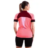 Camiseta de ciclismo rosada con estampado floral y cierre frontal.
