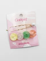 Set de dos broches para el pelo: uno dorado con una perla y otro con cuatro círculos de colores pastel.