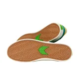 Championes Cariuma Catiba Pro 2.0 color verde con detalles en blanco y amarillo.