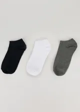 Pack de tres pares de medias de tobillo lisas, una negra, una blanca y una gris.