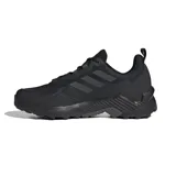 Championes de trekking Adidas Terrex Eastrail 2, color negro, con exterior de malla resistente a la abrasión y revestimientos sintéticos. Cuentan con suela Traxion para un excelente agarre en terrenos escarpados.