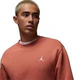 Buzo color ladrillo, de corte clásico, con cuello redondo y logo de Jordan bordado en blanco en el pecho.