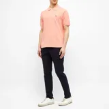 Remera Lacoste de jersey de algodón pima color salmón, con cuello redondo y logo bordado en el pecho.