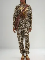 Pantalón de jogging con estampado animal print de leopardo, cintura y tobillos elásticos.