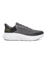 Championes Under Armour Charged Rogue 5, color gris con detalles en negro y logo amarillo en el talón.