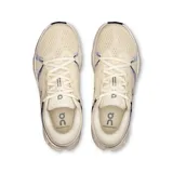 Championes de running On Cloudsurfer 2, color beige con detalles en blanco y logo plateado.