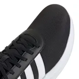 Championes deportivos Adidas modelo Lite Racer 4.0, color negro con tres franjas laterales blancas. Presentan una entresuela blanca con tecnología Cloudfoam visible en el lateral y capellada de malla transpirable.