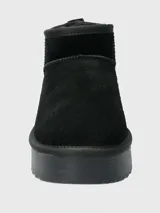Bota corta color marrón claro de cuero con plataforma y forro de poliéster.