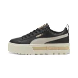 Championes Puma Mayze Lth negros con franja lateral color arena y suela de plataforma color crema.