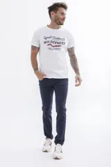 Remera de manga corta color verde azulado con cuello redondo y estampado frontal con el texto "UH3" en blanco.