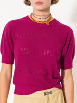 Sweater celeste tejido en bucle, de mangas cortas y largo a la primer cadera.