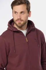 Canguro con cierre y capucha color bordó, confeccionado en felpa de algodón y poliéster.