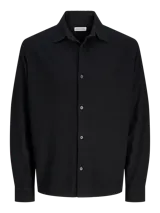 Camisa de manga larga Jack & Jones con cuello clásico y calce relajado. Confeccionada en tejido jacquard con un sutil patrón animal print, en una mezcla de algodón, viscosa y lino. Presenta cierre frontal con botones a tono.