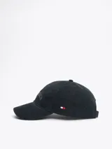 Gorra de béisbol azul marino de algodón lavado, con logo de Tommy Hilfiger bordado en el frente y bandera de la marca en el lateral.