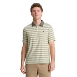 Chomba manga corta color beige con estampado de líneas onduladas en verde oscuro. Tiene cuello polo verde oscuro y logo pequeño en el pecho.