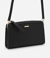 Cartera transversal pequeña de PU color negro, con cierre de cremallera y correa larga.