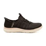 Championes deportivos Skechers Slip-ins Virtue Glow, color negro con suela color crema y cordones elásticos.