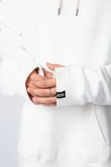 Buzo canguro negro de algodón friza, corte oversize y estampa de Mickey Mouse con detalles en verde.