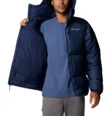 Campera puffer negra marca Columbia, con capucha ajustable, cierre frontal con cremallera, bolsillos laterales con cremallera, puños elásticos y aislamiento Thermarator™.