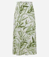 Pollera midi evasé de mujer, con cintura elástica y estampado de follaje en tonos verdes sobre fondo blanco.