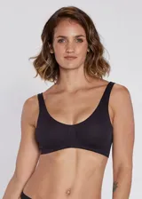 Soutien de microfibra sin costura tipo top, sin aro ni copa y bretel ancho.