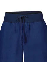 Pantalón azul de lino orgánico con pretina de jersey ajustable, calce regular y bolsillos en el frente y trasero.