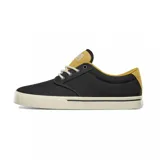 Championes Etnies Jameson 2 Eco, color negro con detalles en amarillo mostaza y suela color crema.