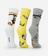 Kit de tres pares de medias de caña alta con diseños de los personajes de Looney Tunes: Bugs Bunny, Piolín y el Demonio de Tasmania.