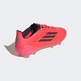Championes de fútbol Adidas F50 Elite color rosa con detalles en negro.