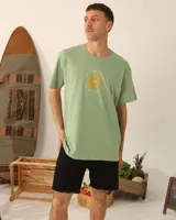 Remera unisex color crema con estampado de un sol anaranjado.