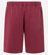 Bermuda de sarga lavada color verde claro, con lazo ajustable en la cintura, bolsillos laterales y un pequeño parche negro con logo en la pierna izquierda.